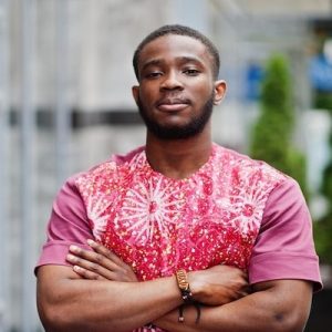 portrait black young man wearing african traditional red colorful clothes_627829 4909 300x300 1